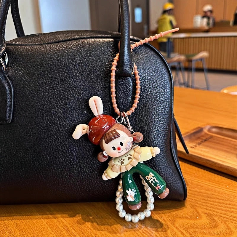 Lovely Sister Korean Style Doll Bag Charm – Handcrafted Full-Grain Lambskin Keychain – Cute Pearl Accent Design for Girls – Creative Gift Idea